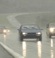 cars driving down wet highway with light rain