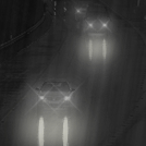 cars driving down highway in heavy rain