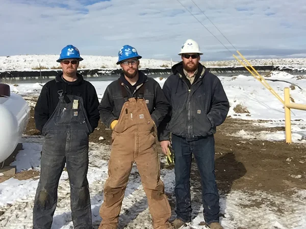 Snowy Electricians at the work site