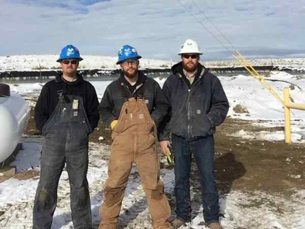 Snowy Electricians at the work site