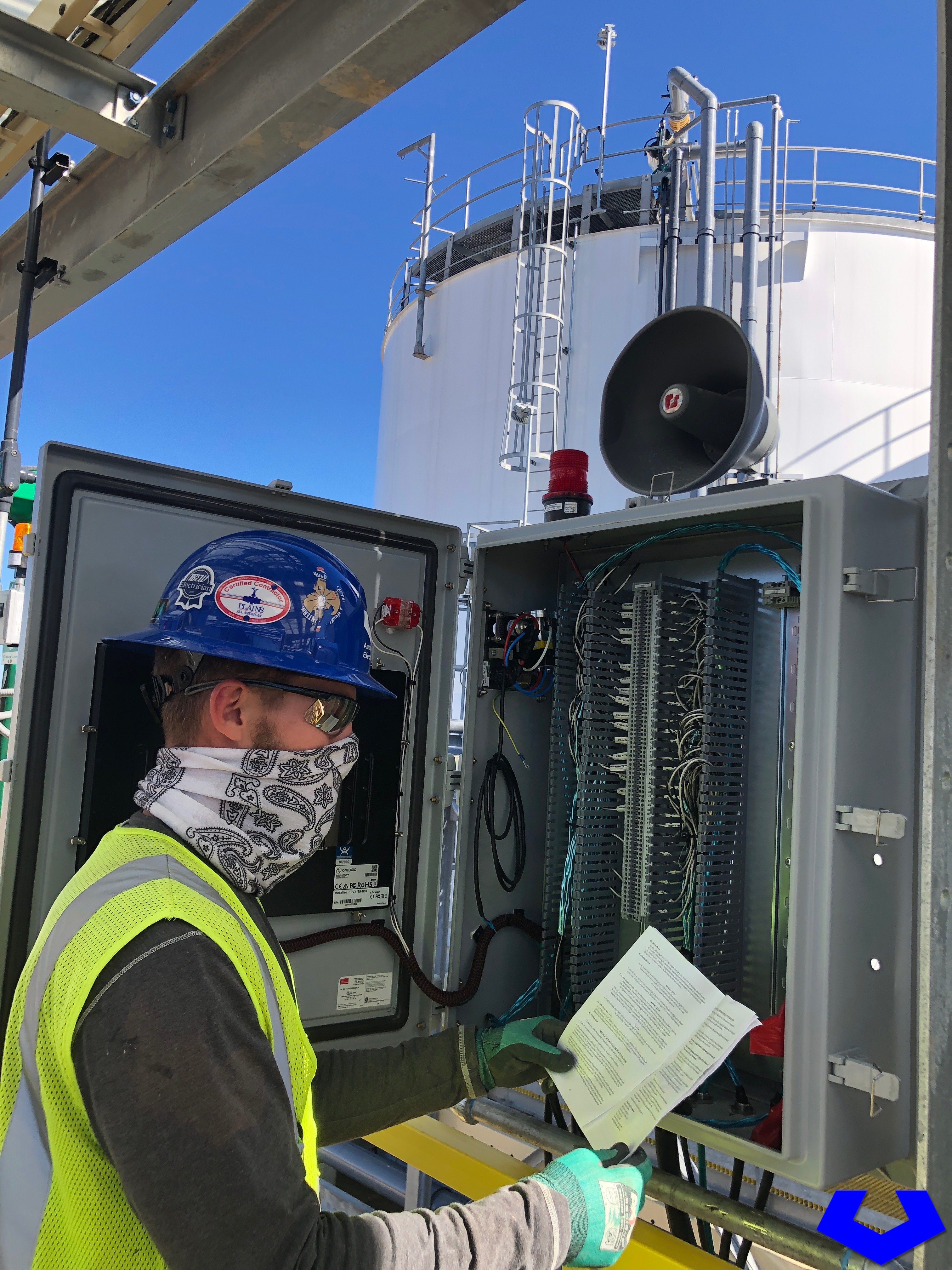 Automation and Electronics, Inc. electricians checking wiring.