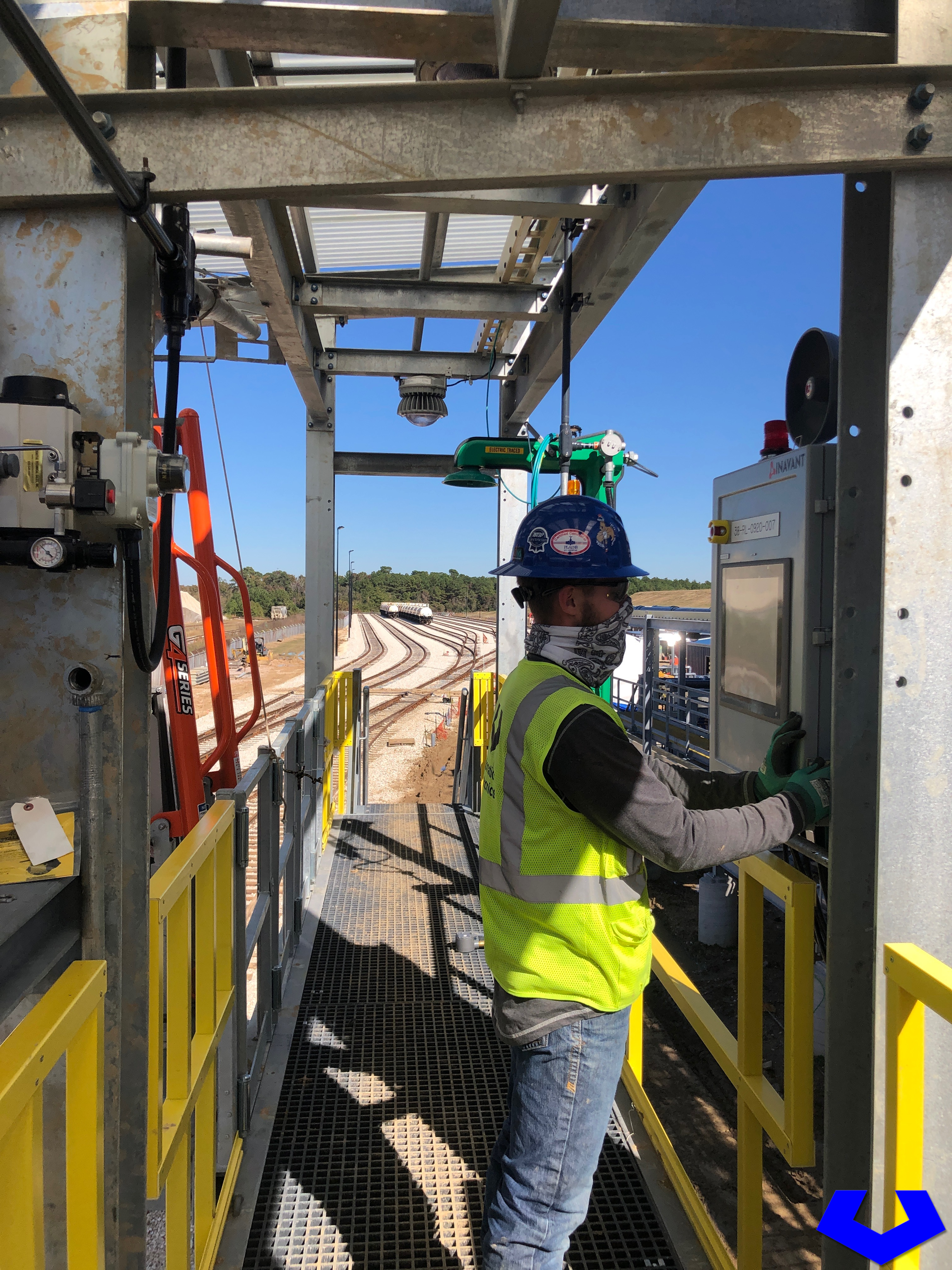 Automation and Electronics, Inc. electricians checking panel.